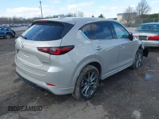 2024 Mazda CX-5 2.5 S Premium Package with VIN JM3KFBDL5R0465272, listed as a IAAI auction lot 41959823 with 12,777 mi miles. Bid and sale history available at carsss.com. Image 4.