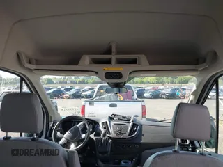 2015 Ford Transit Passenger XL z VIN 1FBAX2CG7FKA75719, wystawiony jako IAAI lot #42135118 z przebiegiem Nie podano mil oraz . Historia ofert i sprzedaży dostępna na DreamBid. Obrazek 21.