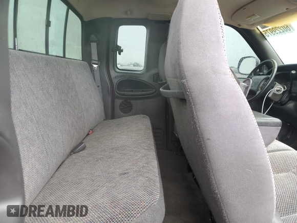 2001 Dodge 1500 z VIN 1B7HC13Y11J273414, wystawiony jako Copart lot #60229975 z przebiegiem 181 604 mil mil oraz Szkoda całkowita • Salvage title. Historia ofert i sprzedaży dostępna na DreamBid. Obrazek 10.
