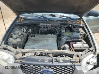 2006 Ford Escape Hybrid z VIN 1FMCU96H86KB36291, wystawiony jako Copart lot #64482105 z przebiegiem 224 253 mil mil oraz Czysty tytuł • Clean title. Historia ofert i sprzedaży dostępna na DreamBid. Obrazek 11.