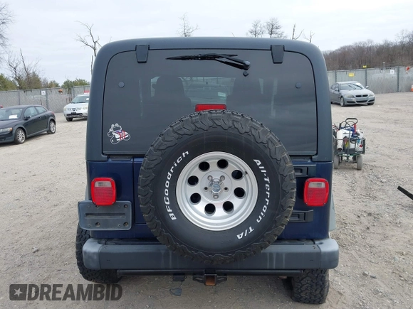2006 Jeep Wrangler Sport with VIN 1J4FA49S16P737060, listed as a IAAI auction lot 41784197 with 42,030 mi miles. Bid and sale history available at carsss.com. Image 16.