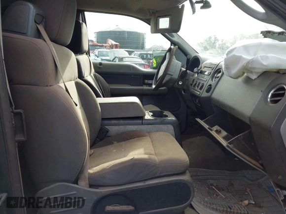 2007 Ford F-150 STX with VIN 1FTRX12W57FB35590, listed as a IAAI auction lot 41518237 with 242,321 mi miles and . Bid and sale history available at DreamBid. Image 5.