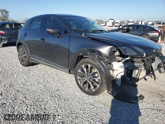 2019 Mazda CX-3 Grand Touring with VIN JM1DKFD77K0447529, listed as a Copart auction lot 43562565 with 57,321 mi miles and Salvage Title. Bid and sale history available at DreamBid. Image 4.
