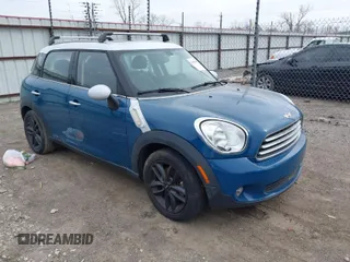 2012 MINI Countryman with VIN WMWZB3C59CWM06836, listed as a IAAI auction lot 41690459 with 172,163 mi miles and . Bid and sale history available at DreamBid. Image 1.
