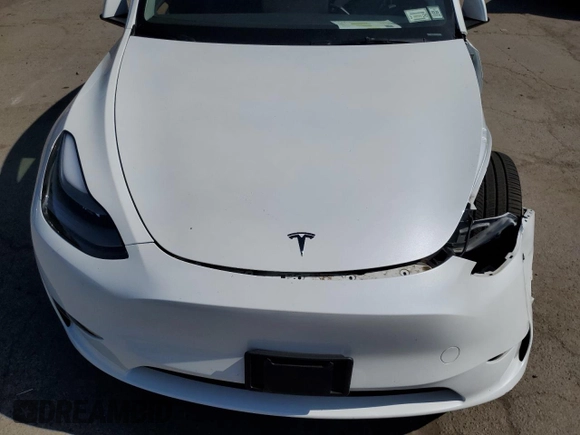 2024 Tesla Model Y Long Range с VIN 7SAYGDEE2RA257279, выставлен на аукционе Copart как лот 61248255 с пробегом Не указан миль и Списание • Salvage title. История ставок и продаж доступна на DreamBid. Изображение 11.