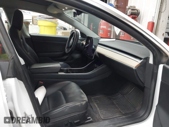 2020 Tesla Model 3 Standard Range Plus with VIN 5YJ3E1EA7LF805828, listed as a IAAI auction lot 41841505 with 44,946 mi miles and . Bid and sale history available at DreamBid. Image 5.