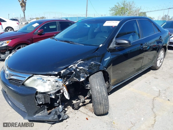 2014 Toyota Camry Hybrid LE with VIN 4T1BD1FK1EU127878, listed as a IAAI auction lot 41823638 with 179,141 mi miles. Bid and sale history available at carsss.com. Image 2.