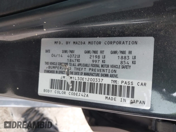 2014 Mazda 3 S Touring with VIN JM1BM1L30E1200337, listed as a IAAI auction lot 41906333 with 92,873 mi miles and . Bid and sale history available at DreamBid. Image 9.