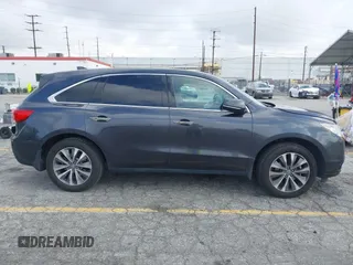 2016 Acura MDX w/Tech with VIN 5FRYD3H47GB020014, listed as a IAAI auction lot 41931725 with 121,520 mi miles. Bid and sale history available at carsss.com. Image 13.