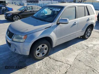 2010 Suzuki Grand Vitara Premium z VIN JS3TE0D29A4100863, wystawiony jako Copart lot #87547975 z przebiegiem 113 398 mil mil oraz Szkody całkowita. Historia ofert i sprzedaży dostępna na DreamBid. Obrazek 1.
