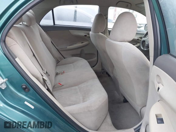 2009 Toyota Corolla with VIN 1NXBU40E39Z047881, listed as a IAAI auction lot 42078719 with 204,258 mi miles. Bid and sale history available at carsss.com. Image 8.
