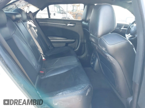 2012 Chrysler 300 SRT-8 with VIN 2C3CCAFJ9CH801749, listed as a IAAI auction lot 40912606 with 144,404 mi miles and . Bid and sale history available at DreamBid. Image 8.