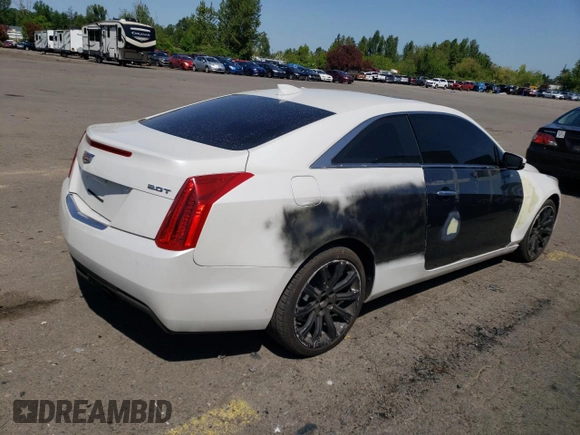2016 Cadillac ATS AWD z VIN 1G6AG1RX3G0131622, wystawiony jako Copart lot #55354585 z przebiegiem 87 073 mil mil oraz Czysty tytuł • Clean title. Historia ofert i sprzedaży dostępna na DreamBid. Obrazek 3.