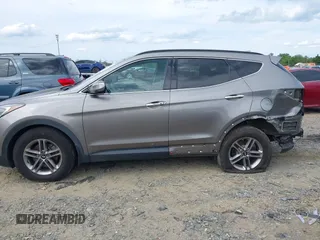 2018 Hyundai Santa Fe 2.4L z VIN 5NMZUDLB4JH073857, wystawiony jako IAAI lot #42200208 z przebiegiem 127 038 mil mil oraz . Historia ofert i sprzedaży dostępna na DreamBid. Obrazek 15.