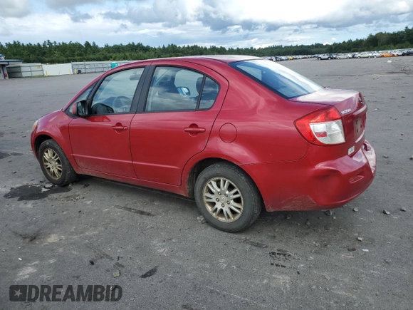 2012 Suzuki SX4 LE with VIN JS2YC5A34C6300079, listed as a Copart auction lot 68414434 with 111,661 mi miles and Salvage Title. Bid and sale history available at carsss.com. Image 2.