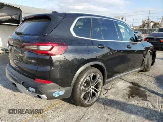 2021 BMW X5 xDrive45e with VIN 5UXTA6C09M9E08945, listed as a Copart auction lot 65677632 with 0 mi miles. Bid and sale history available at carsss.com. Image 4.
