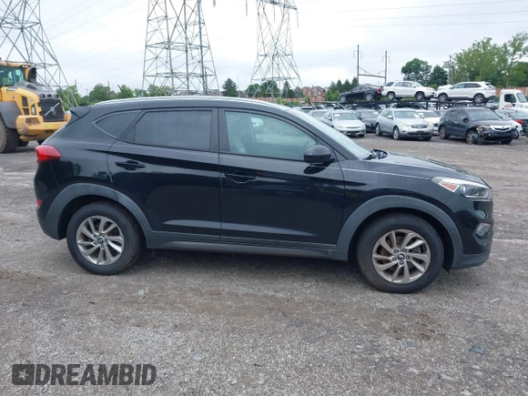 2016 Hyundai Tucson SE z VIN KM8J3CA45GU041303, wystawiony jako IAAI lot #42463591 z przebiegiem 96 516 mil mil oraz . Historia ofert i sprzedaży dostępna na DreamBid. Obrazek 14.