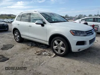2012 Volkswagen Touareg Exec with VIN WVGEF9BP1CD008717, listed as a Copart auction lot 86095164 with 211,089 mi miles and Clean Title. Bid and sale history available at DreamBid. Image 4.
