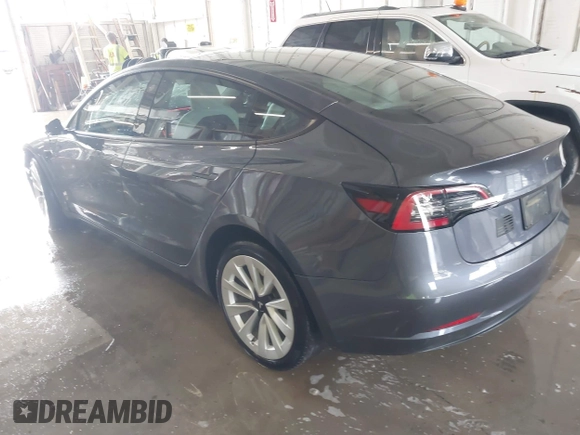 2023 Tesla Model 3 z VIN 5YJ3E1EA2PF591661, wystawiony jako IAAI lot #42014086 z przebiegiem 13 945 mil mil oraz . Historia ofert i sprzedaży dostępna na DreamBid. Obrazek 3.