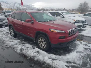2014 Jeep Cherokee Latitude with VIN 1C4PJMCB8EW166853, listed as a IAAI auction lot 41579386 with 251,683 mi miles and . Bid and sale history available at DreamBid. Image 1.
