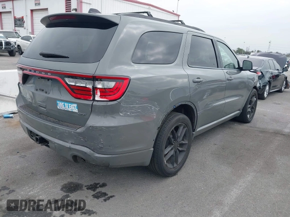 2023 Dodge Durango GT Plus with VIN 1C4RDHDG8PC551884, listed as a IAAI auction lot 42033893 with 43,370 mi miles and . Bid and sale history available at DreamBid. Image 4.