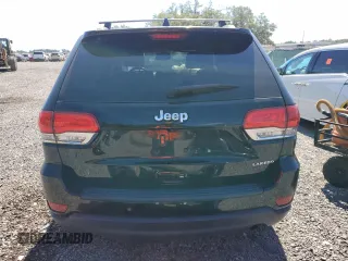 2017 Jeep Grand Cherokee Laredo with VIN 1C4RJEAG9HC780281, listed as a Copart auction lot 50747024 with 100,446 mi miles and Salvage title. Bid and sale history available at DreamBid. Image 6.