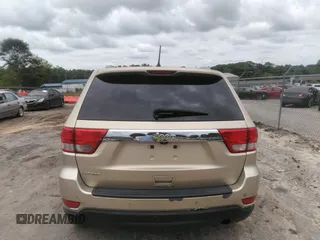 2012 Jeep Grand Cherokee Laredo with VIN 1C4RJEAGXCC157616, listed as a IAAI auction lot 42156539 with 301,661 mi miles. Bid and sale history available at carsss.com. Image 16.