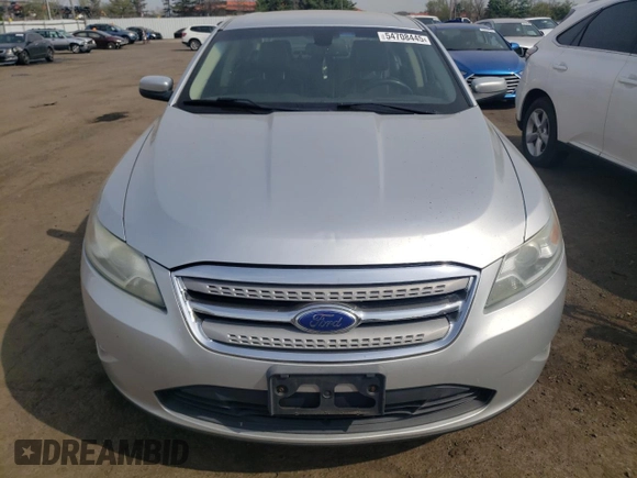 2012 Ford Taurus SEL z VIN 1FAHP2HW4CG129105, wystawiony jako Copart lot #54708445 z przebiegiem 201 450 mil mil oraz Szkoda całkowita • Salvage title. Historia ofert i sprzedaży dostępna na DreamBid. Obrazek 5.