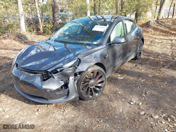 2022 Tesla Model 3 Performance with VIN 5YJ3E1EC5NF270082, listed as a IAAI auction lot 40930688 with 1 mi miles. Bid and sale history available at carsss.com. Image 2.