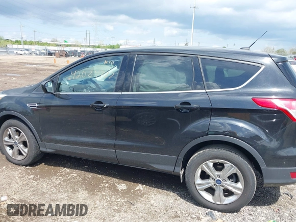 2013 Ford Escape SE with VIN 1FMCU0GX1DUA99040, listed as a IAAI auction lot 42084787 with 140,473 mi miles and . Bid and sale history available at DreamBid. Image 14.