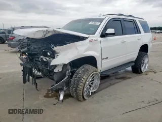2018 Chevrolet Tahoe LT with VIN 1GNSKBKC1JR294115, listed as a Copart auction lot 59769515 with 81,523 mi miles and Salvage title. Bid and sale history available at DreamBid. Image 1.
