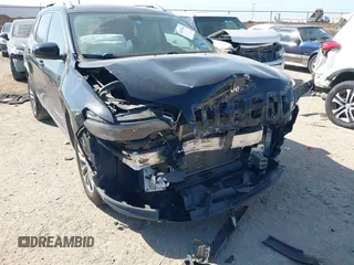 2019 Jeep Cherokee Latitude Plus with VIN 1C4PJLLB4KD312411, listed as a IAAI auction lot 41677041 with 82,802 mi miles and . Bid and sale history available at DreamBid. Image 6.