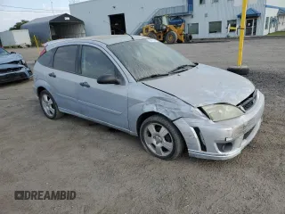 2007 Ford Focus S with VIN 1FAFP37N77W337626, listed as a Copart auction lot 70451294 with 174,068 mi miles and Salvage Title. Bid and sale history available at carsss.com. Image 4.
