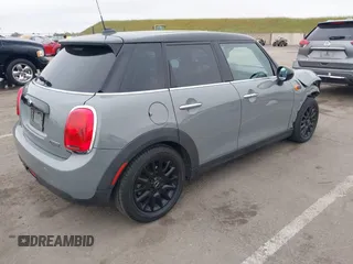 2015 MINI Hardtop 4 Door with VIN WMWXS5C52FT829699, listed as a IAAI auction lot 42078187 with 59,641 mi miles and . Bid and sale history available at DreamBid. Image 4.