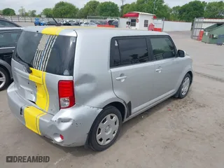 2012 Scion xB with VIN JTLZE4FE0CJ012235, listed as a IAAI auction lot 41894195 with 196,970 mi miles. Bid and sale history available at carsss.com. Image 4.