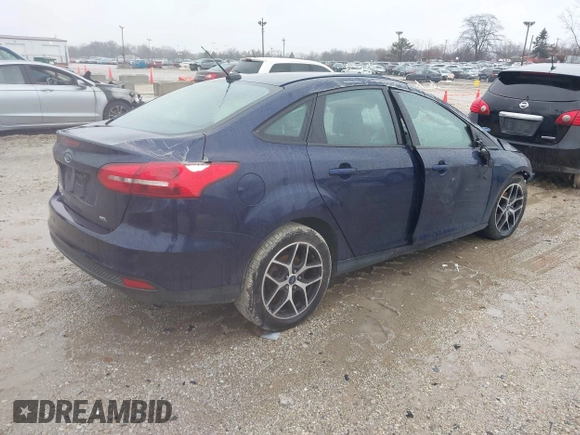 2017 Ford Focus SEL with VIN 1FADP3H29HL312631, listed as a IAAI auction lot 41226591 with 133,814 mi miles. Bid and sale history available at carsss.com. Image 4.