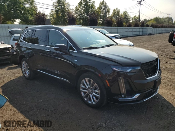 2023 Cadillac XT6 AWD Premium Luxury with VIN 1GYKPDRS6PZ185431, listed as a Copart auction lot 70475734 with 11,276 mi miles and Salvage Title. Bid and sale history available at carsss.com. Image 4.