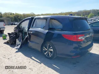 2020 Honda Odyssey Elite with VIN 5FNRL6H95LB052590, listed as a IAAI auction lot 42231280 with 65,165 mi miles and . Bid and sale history available at DreamBid. Image 3.