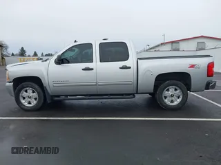 2011 Chevrolet Silverado 1500 LT with VIN 3GCPKSE30BG219790, listed as a IAAI auction lot 41163358 with 152,503 mi miles. Bid and sale history available at carsss.com. Image 14.