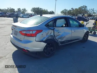 2012 Ford Focus SE with VIN 1FAHP3F23CL265724, listed as a IAAI auction lot 41184121 with 216,873 mi miles. Bid and sale history available at carsss.com. Image 4.