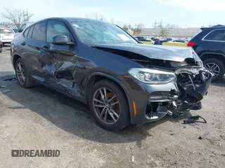2021 BMW X4 xDrive30i z VIN 5UX2V1C02M9G88260, wystawiony jako IAAI lot #41991270 z przebiegiem 48 817 mil mil oraz . Historia ofert i sprzedaży dostępna na DreamBid. Obrazek 1.
