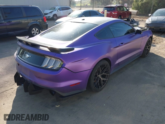 2015 Ford Mustang EcoBoost with VIN 1FA6P8TH5F5358816, listed as a IAAI auction lot 41573005 with 57,975 mi miles and . Bid and sale history available at carsss.com. Image 4.
