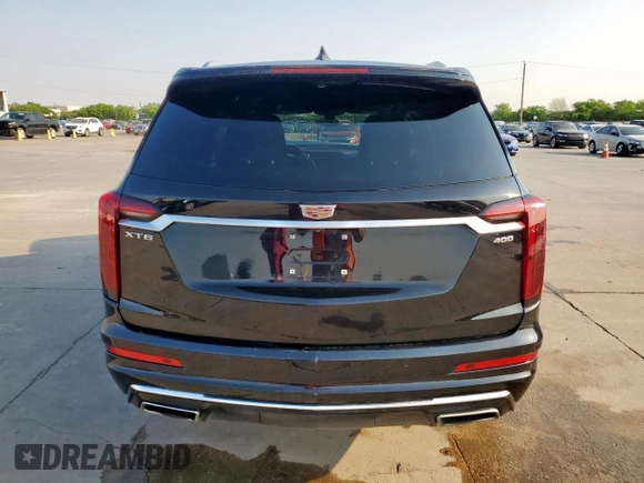 2021 Cadillac XT6 Premium Luxury z VIN 1GYKPCRS3MZ195999, wystawiony jako Copart lot #53261595 z przebiegiem 81 843 mil mil oraz Szkoda całkowita • Salvage title. Historia ofert i sprzedaży dostępna na DreamBid. Obrazek 6.
