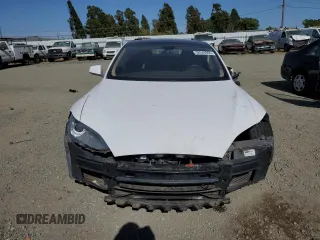 2014 Tesla Model S 60 z VIN 5YJSA1S11EFP41087, wystawiony jako Copart lot #58346805 z przebiegiem Nie podano mil oraz Szkoda całkowita • Salvage title. Historia ofert i sprzedaży dostępna na DreamBid. Obrazek 5.
