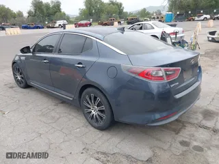 2014 Kia Optima Hybrid LX with VIN KNAGM4AD4E5066067, listed as a IAAI auction lot 41884259 with 131,077 mi miles. Bid and sale history available at carsss.com. Image 3.