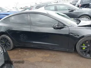 2023 Tesla Model 3 z VIN 5YJ3E1EA1PF512562, wystawiony jako IAAI lot #41719618 z przebiegiem 43 612 mil mil oraz . Historia ofert i sprzedaży dostępna na DreamBid. Obrazek 14.