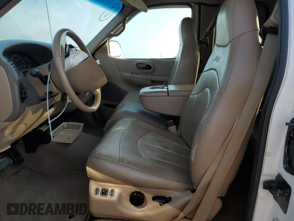 1999 Ford F-150 XL with VIN 1FTRX17L2XKC10123, listed as a Copart auction lot 83158894 with 57,446 mi miles and Salvage Title. Bid and sale history available at carsss.com. Image 7.