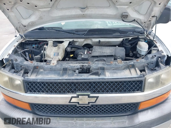 2012 Chevrolet Express Passenger 1LT z VIN 1GAZG1FG9C1129455, wystawiony jako IAAI lot #42105765 z przebiegiem 150 090 mil mil oraz . Historia ofert i sprzedaży dostępna na DreamBid. Obrazek 10.