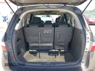 2012 Honda Odyssey Touring with VIN 5FNRL5H93CB109394, listed as a IAAI auction lot 42280018 with 190,412 mi miles and . Bid and sale history available at DreamBid. Image 16.