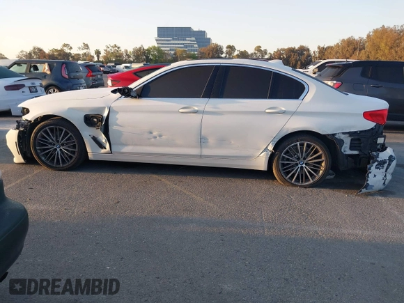 2020 BMW 5 Series 530e with VIN WBAJA9C08LCD41408, listed as a IAAI auction lot 41959134 with 112,733 mi miles and . Bid and sale history available at carsss.com. Image 15.